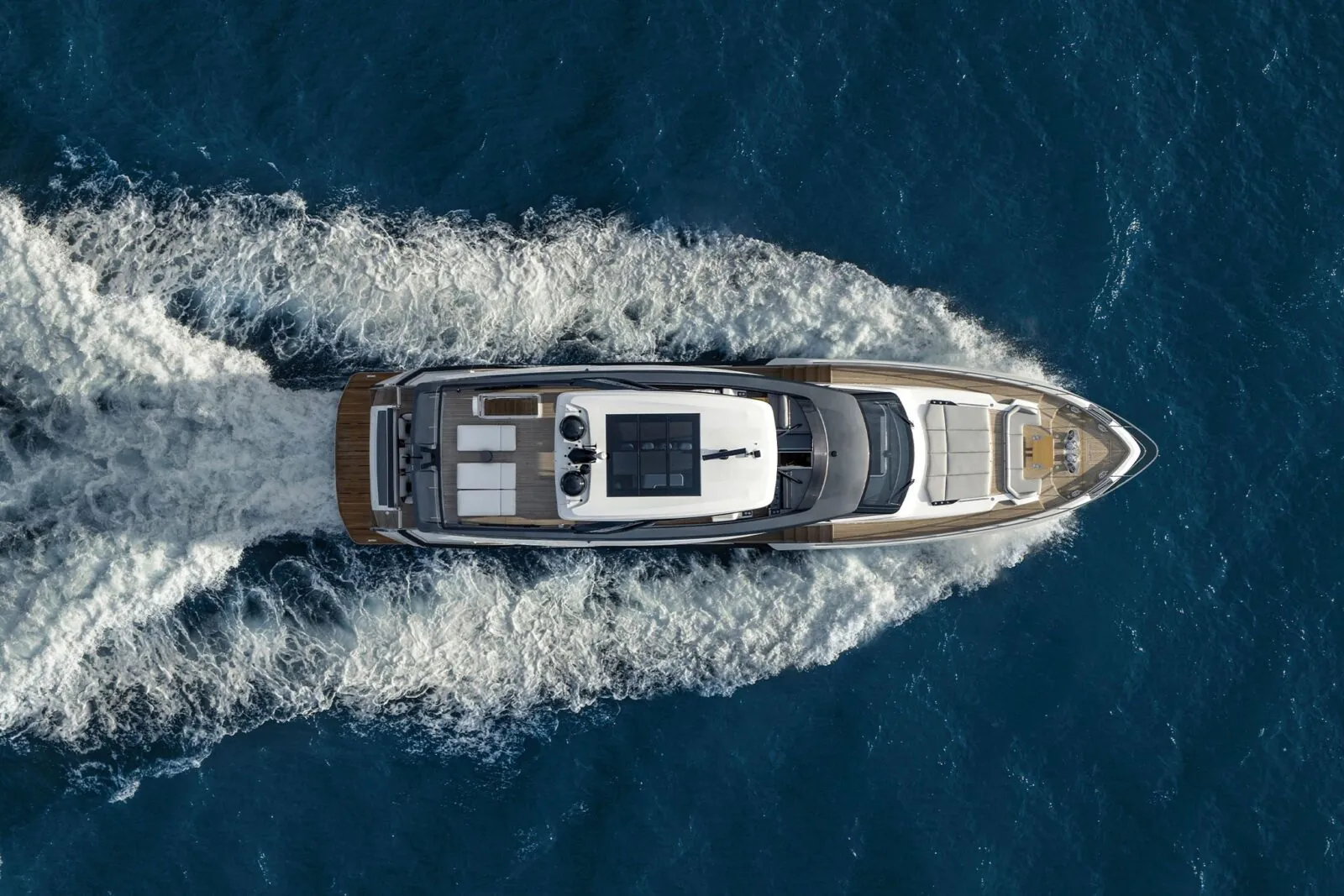 Ferretti Yachts for Sale photo shows luxury yacht running.