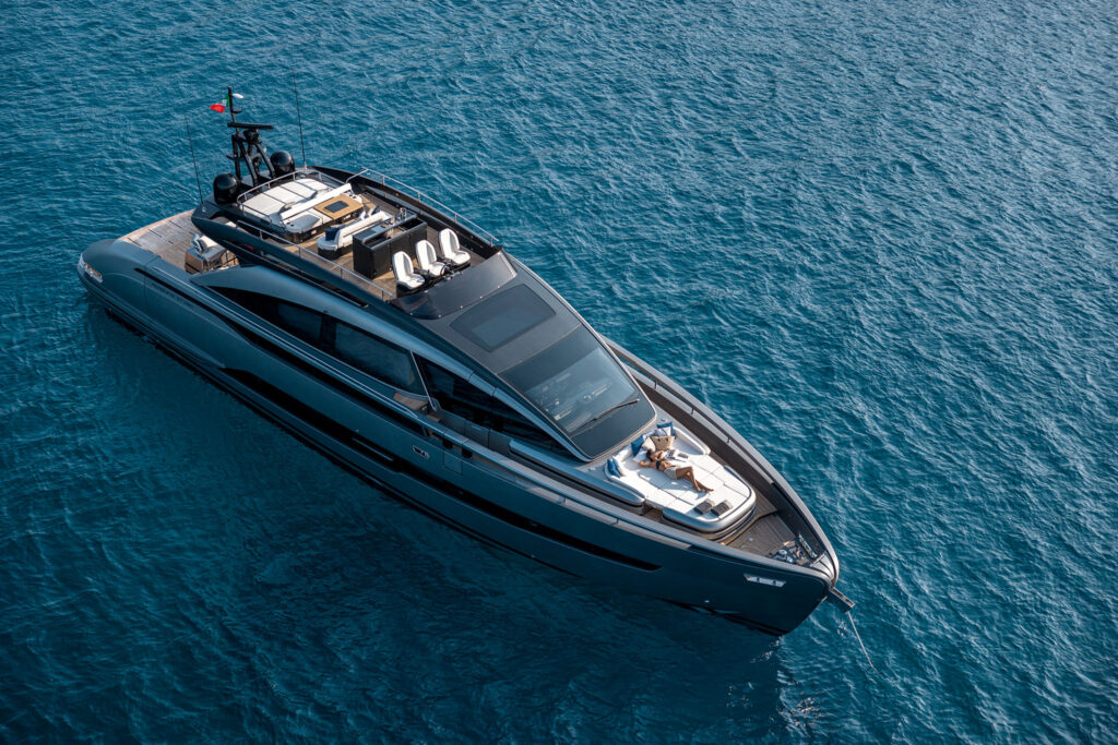 The Pershing GTX80 at speed, demonstrating the performance capabilities that complement its elegant Italian styling.